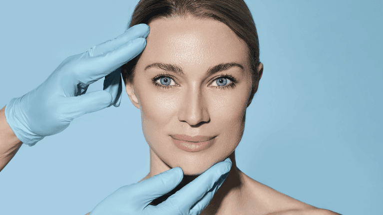 Woman smiling getting fitted for dermal fillers, Huntsville AL