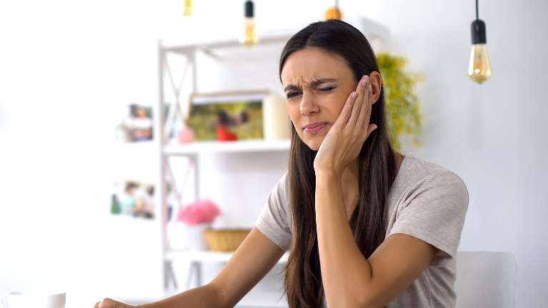 A woman with a toothache
