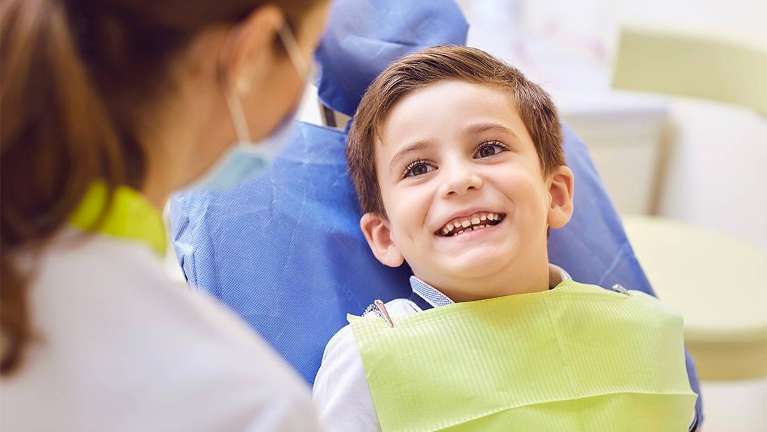 Dental exam for a young boy | Pediatric Dentistry Huntsville AL