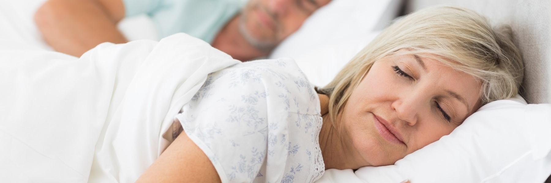 Couple Sleeping after sleep apnea treatment in Huntsville AL